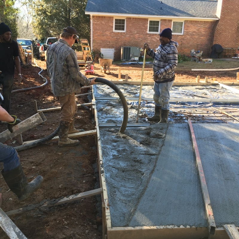 pouring concrete slab steel garage 